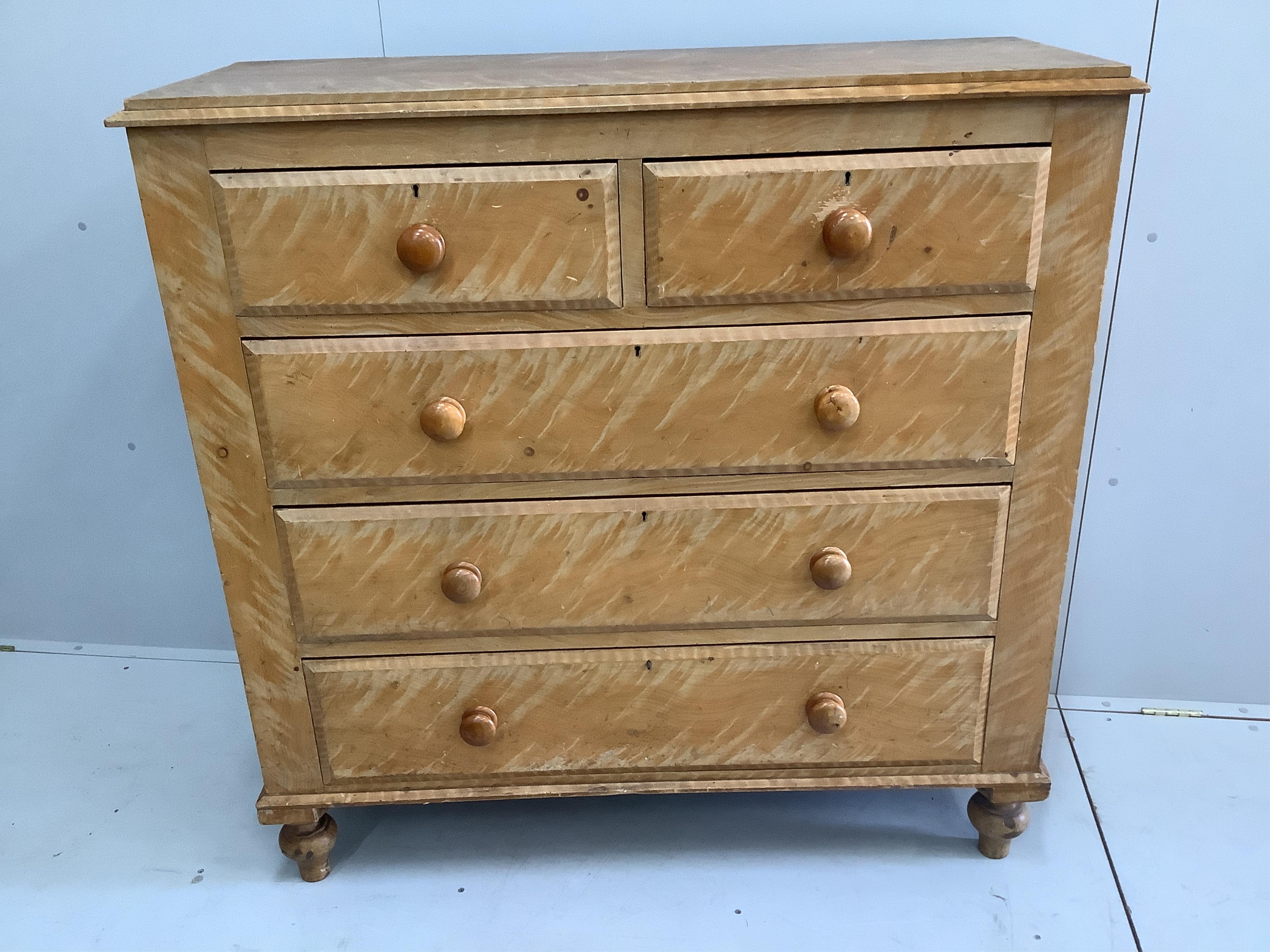 A late Victorian pine chest with painted simulated grain, width 119cm, depth 47cm, height 119cm. Condition - fair